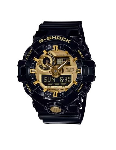 Reloj negro y dorado g-shock